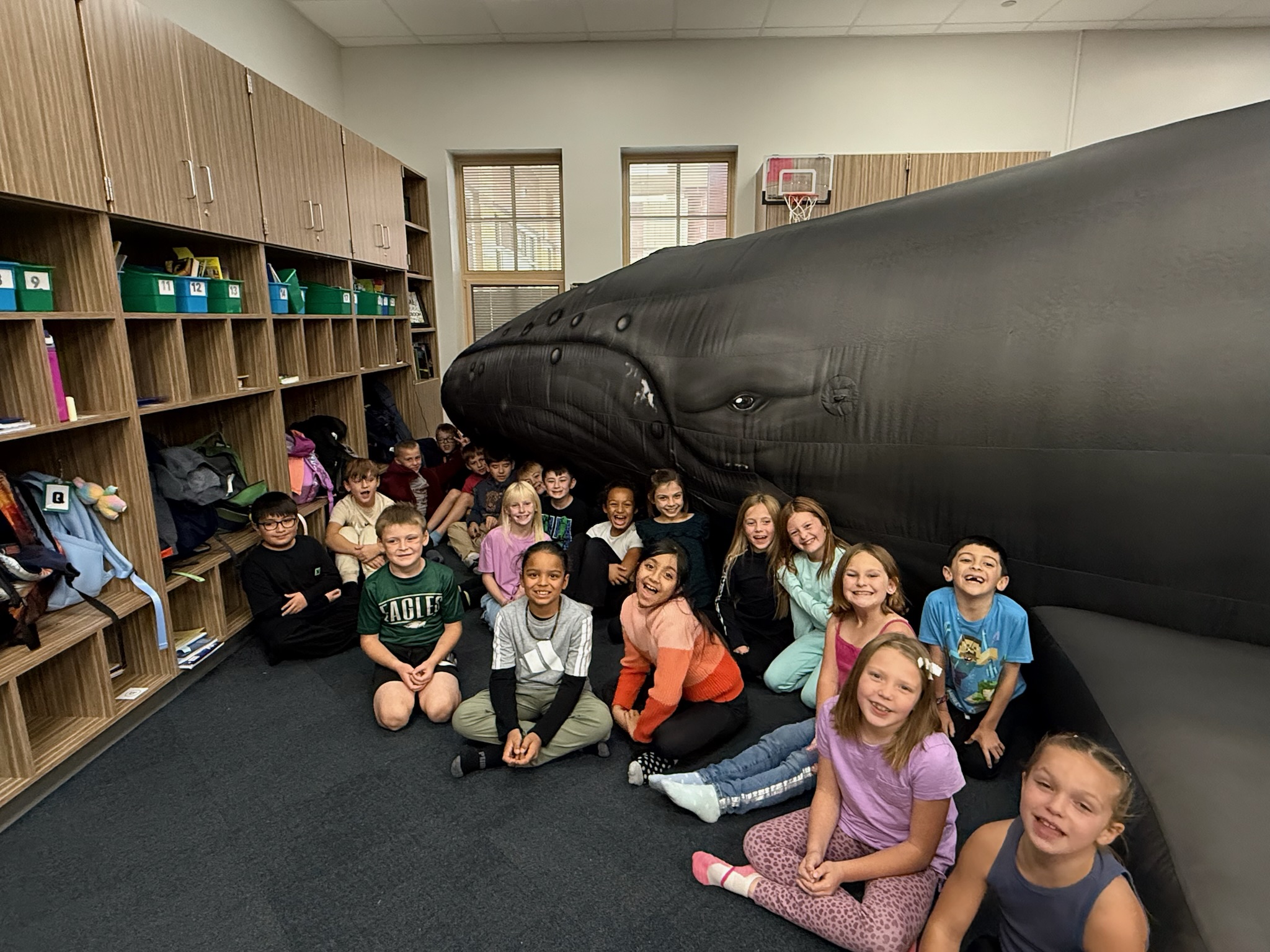 Students exploring an interactive exhibit