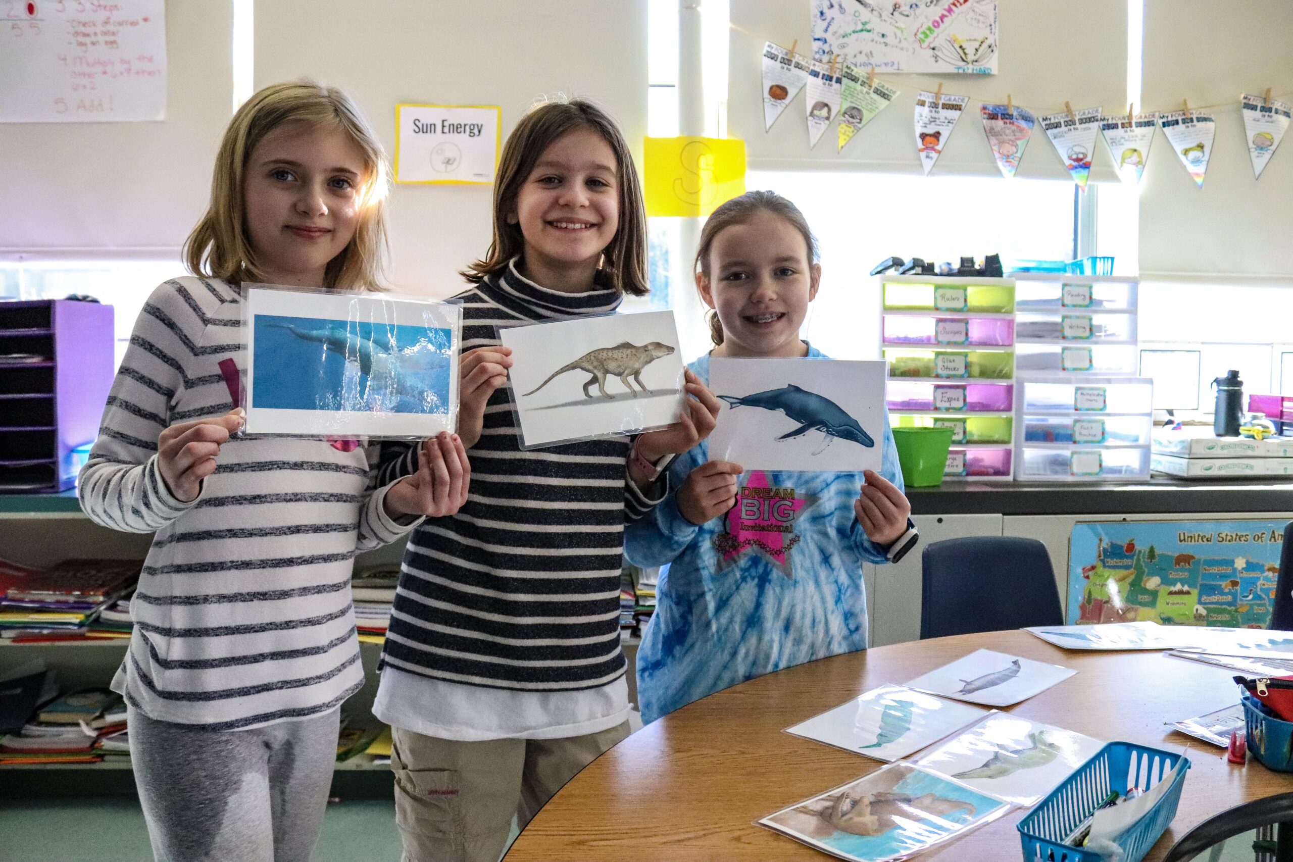 Students exploring an interactive exhibit
